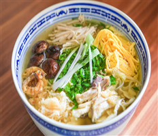 Rice vermicelli soup with chicken, eggs, and pork
